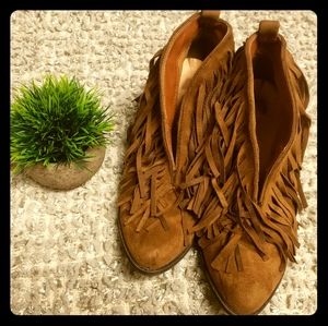 Brown tassled booties